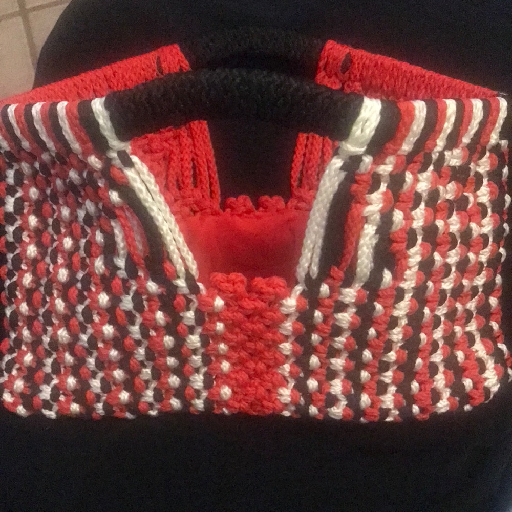 Red, black and white clutch bag